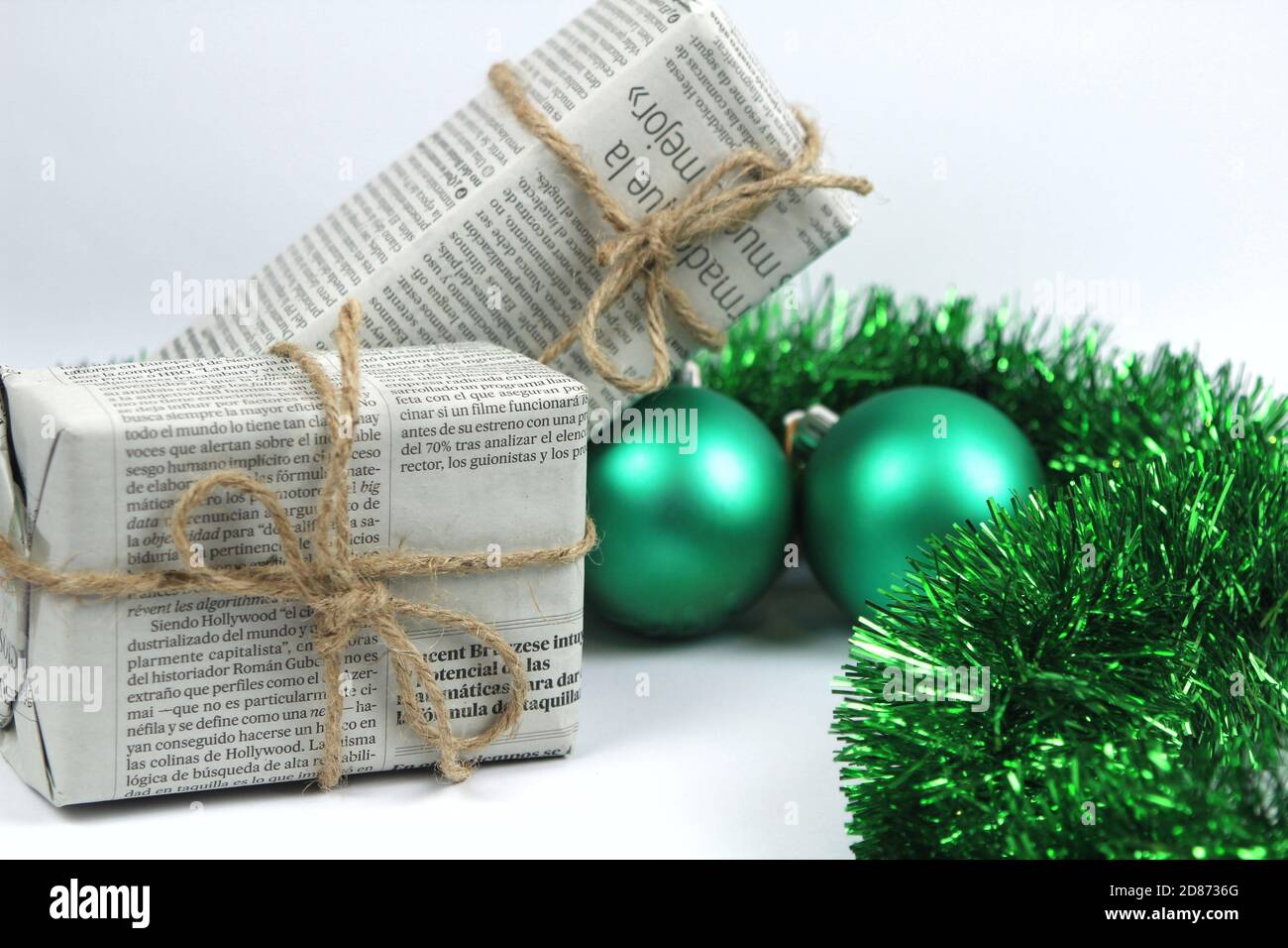 Alicante, Spain- October 18, 2020:Gifts wrapped in old newspaper with ...