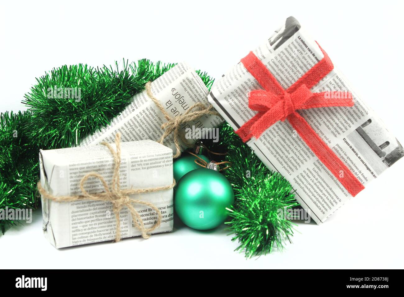Alicante, Spain- October 18, 2020:Gifts wrapped in old newspaper with ...