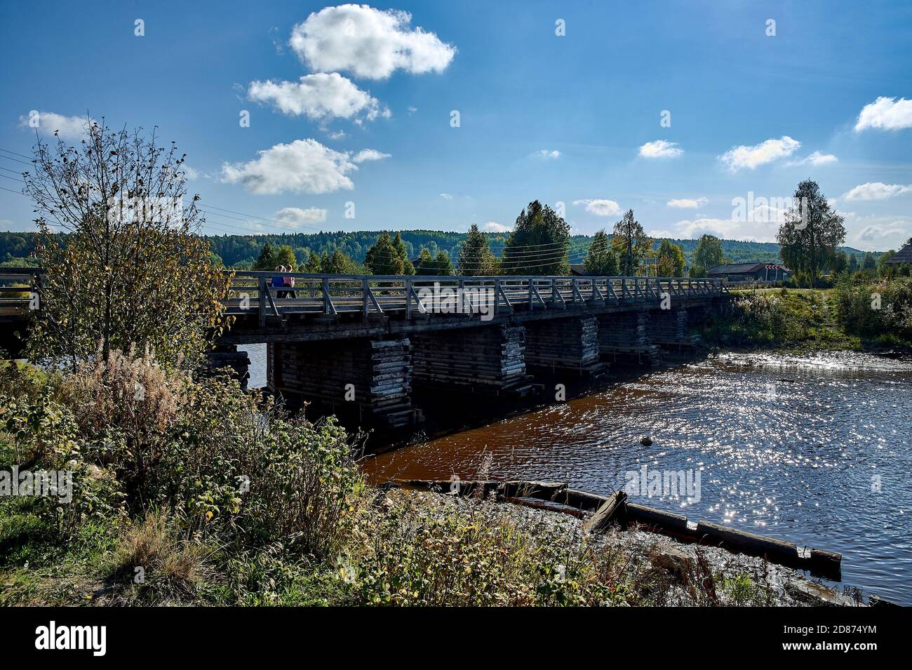 Old ruined wooden bridge over a shallow rural river Stock Photo - Alamy