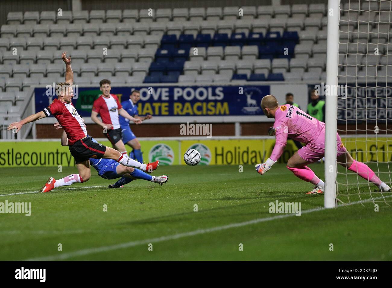 Hartepool, County Durham, UK. 27th Oct 2020. Lewis Cass of Hartlepool United  in action with Altrincham's Yusifu Ceesay during the Vanarama National  League match between Hartlepool United and Altrincham at Victoria Park