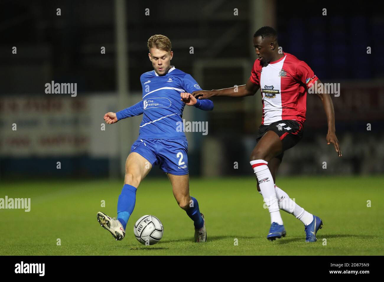 Hartepool, County Durham, UK. 27th Oct 2020. Lewis Cass of Hartlepool United  in action with Altrincham's Yusifu Ceesay during the Vanarama National  League match between Hartlepool United and Altrincham at Victoria Park