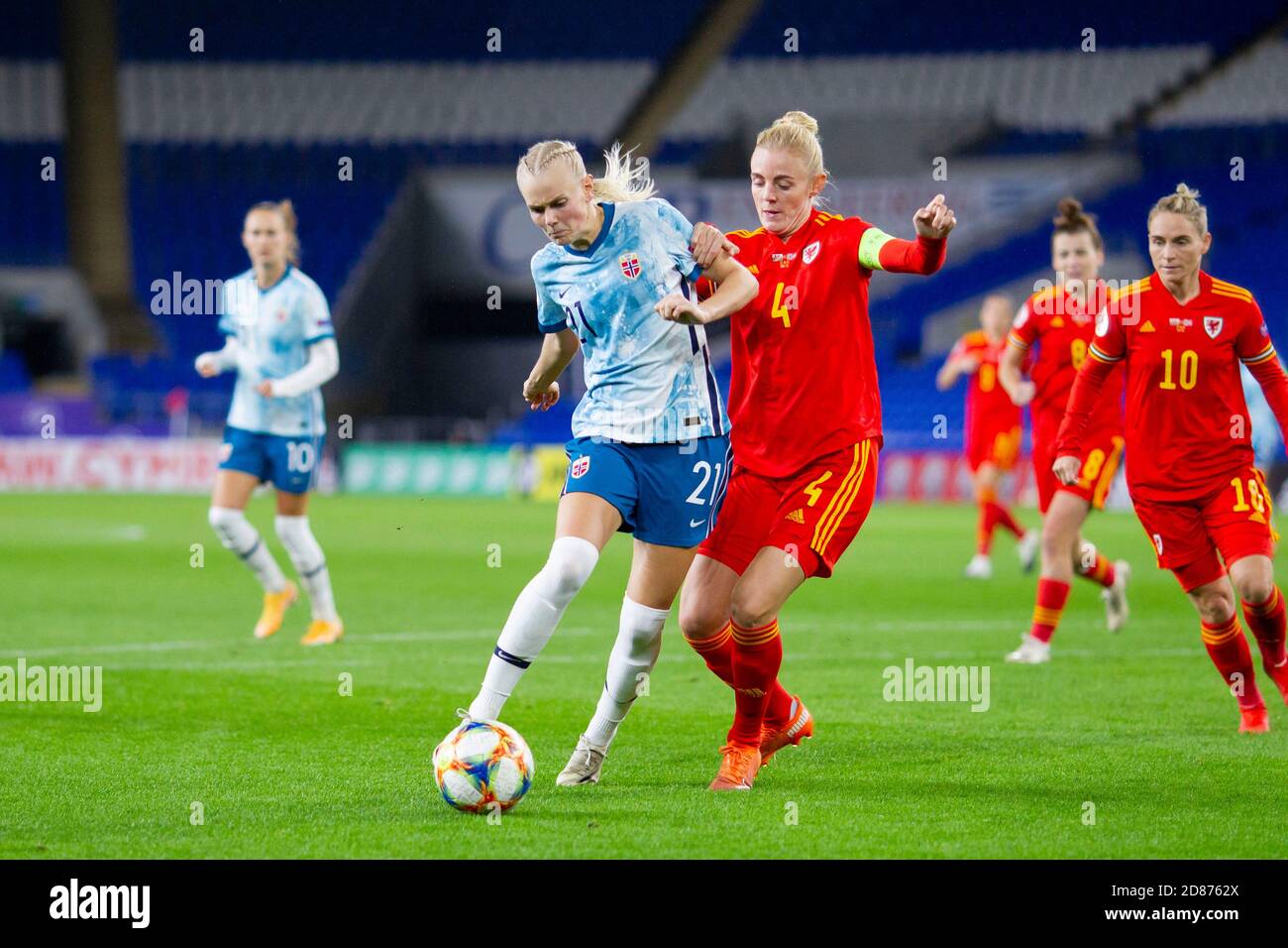 Cardiff, Wales, UK. 27th Oct, 2020. Karina Saevik of Norway and Sophie Ingle of Wales during the UEFA Women's Euro 2022 qualification match between Wales and Norway at Cardiff City Stadium. Credit: Mark Hawkins/Alamy Live News Stock Photo