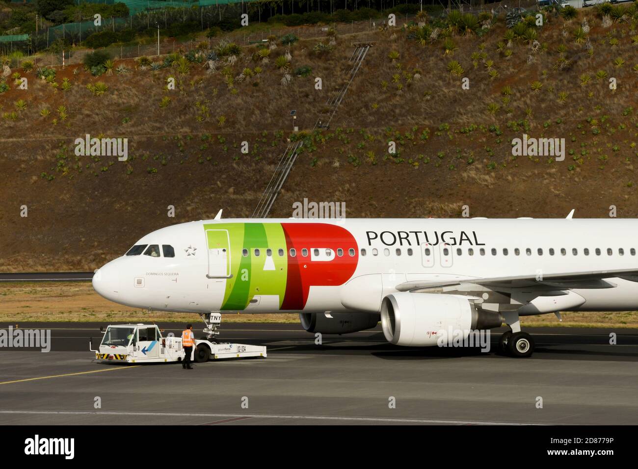 Funchal, Madeira, Portugal - September 2017: Close up of a TAP Portugal Airbus A320 aircraft being pushed by from the terminal for departure Stock Photo