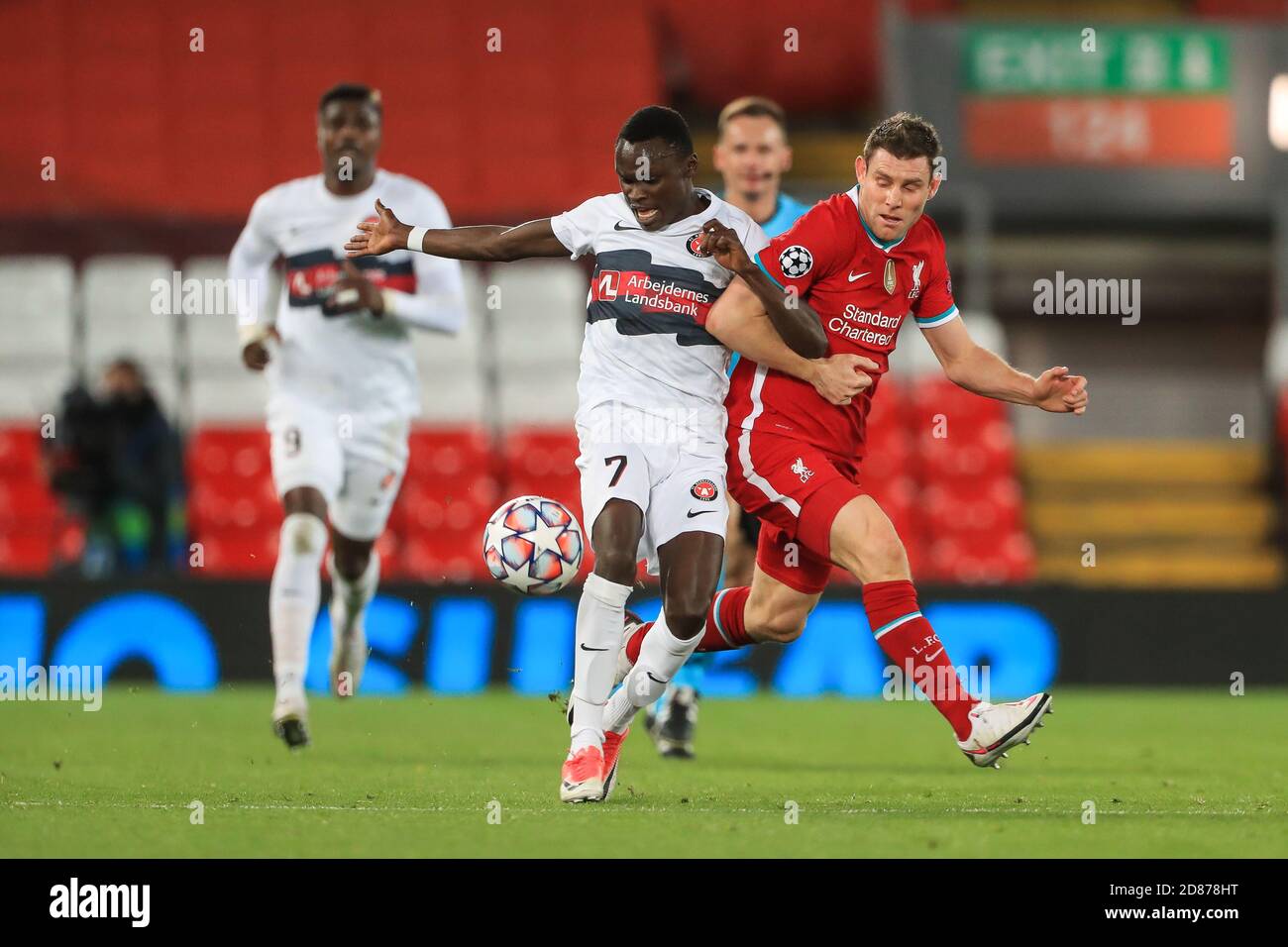 James Milner (7) of Liverpool fouls Pione Sisto (7) of FC Midtjylland Credit: News Images /Alamy Live News Stock Photo