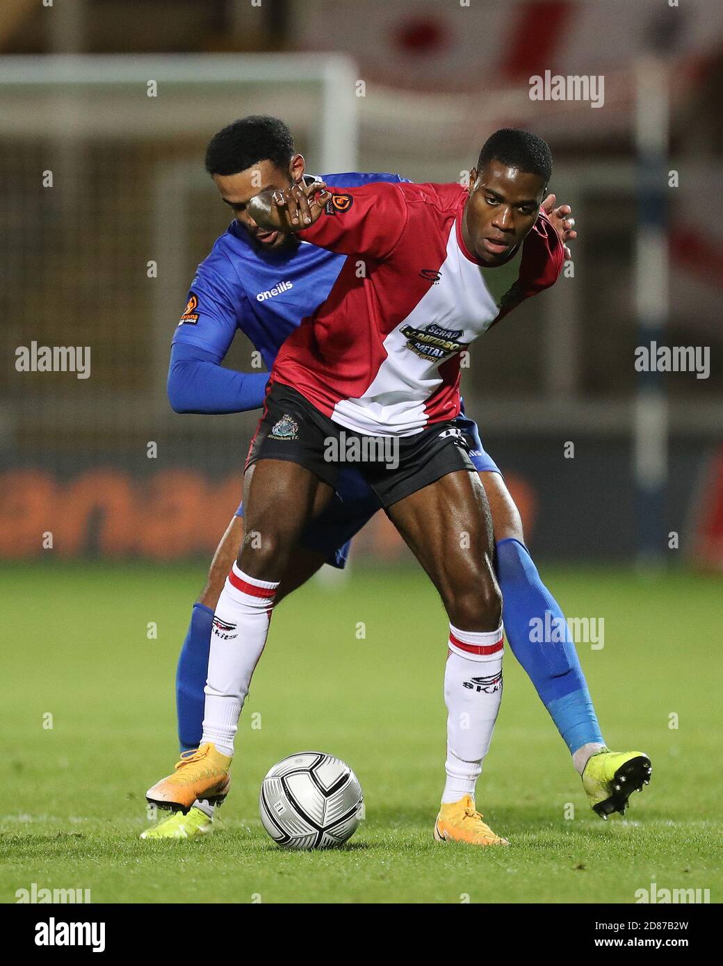 Hartepool, County Durham, UK. 27th Oct 2020. Lewis Cass of Hartlepool United  in action with Altrincham's Yusifu Ceesay during the Vanarama National  League match between Hartlepool United and Altrincham at Victoria Park