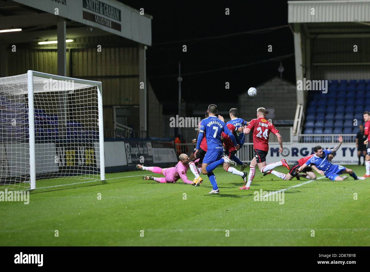 Hartepool, County Durham, UK. 27th Oct 2020. Lewis Cass of Hartlepool United  in action with Altrincham's Yusifu Ceesay during the Vanarama National  League match between Hartlepool United and Altrincham at Victoria Park