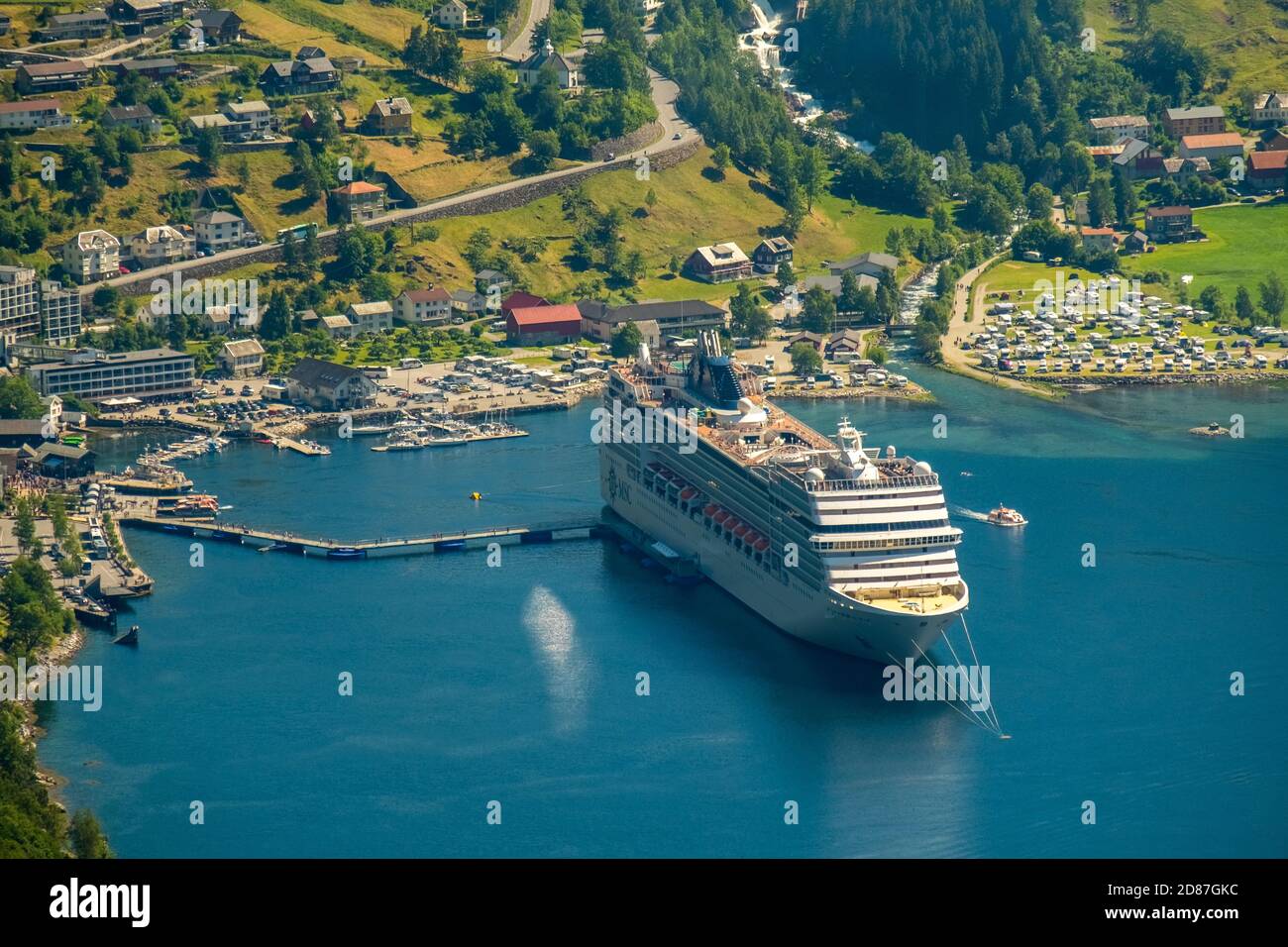 GeirangerFjord, local view Geiranger, ship MSC Orchestra at anchor, Møre og Romsdal, Norway, Scandinavia, Europe, adventure trip, mooring, boats, tour Stock Photo