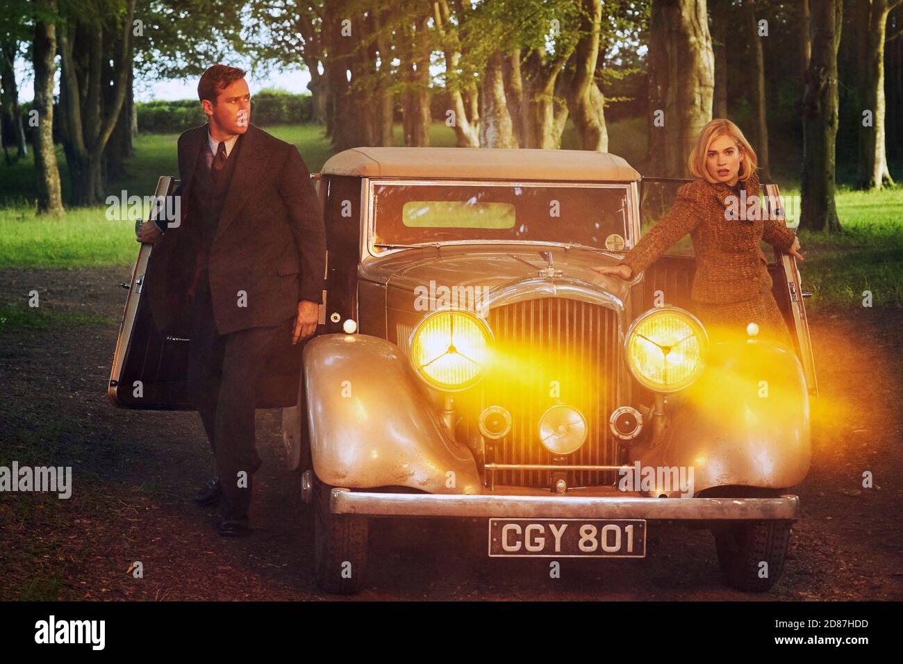 REBECCA, from left Armie hammer, Lily James, 2020. ph Kerry Brown / © Netflix / Courtesy