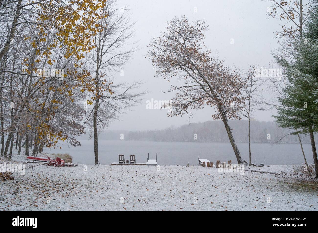 Snow covered view of lake Stock Photo Alamy