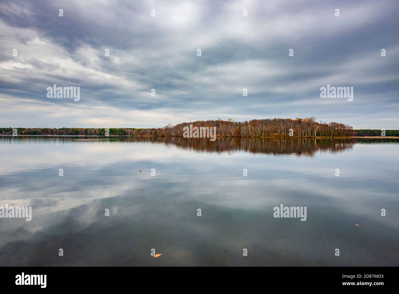 Island on lake with fall colors Stock Photo