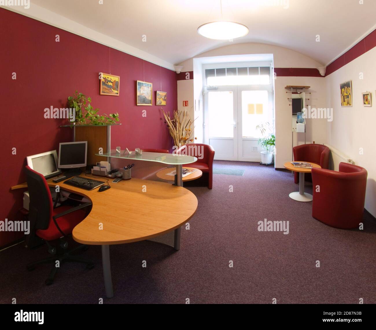 Waiting room with reception in dental clinic Stock Photo - Alamy