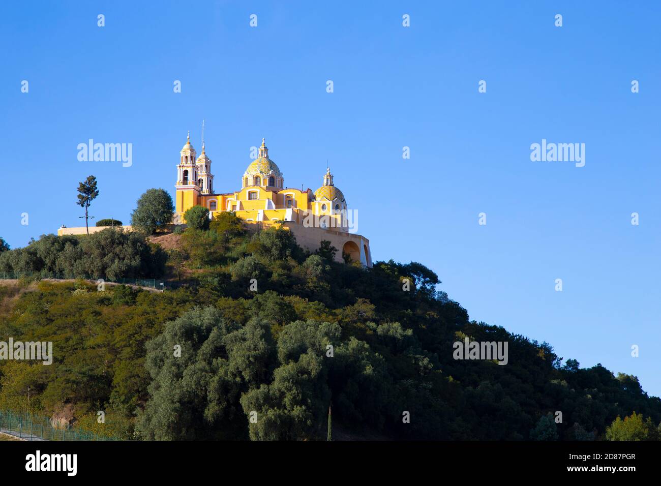 Iconic Cholula's pyramid and church on top, during blue sky day Stock ...