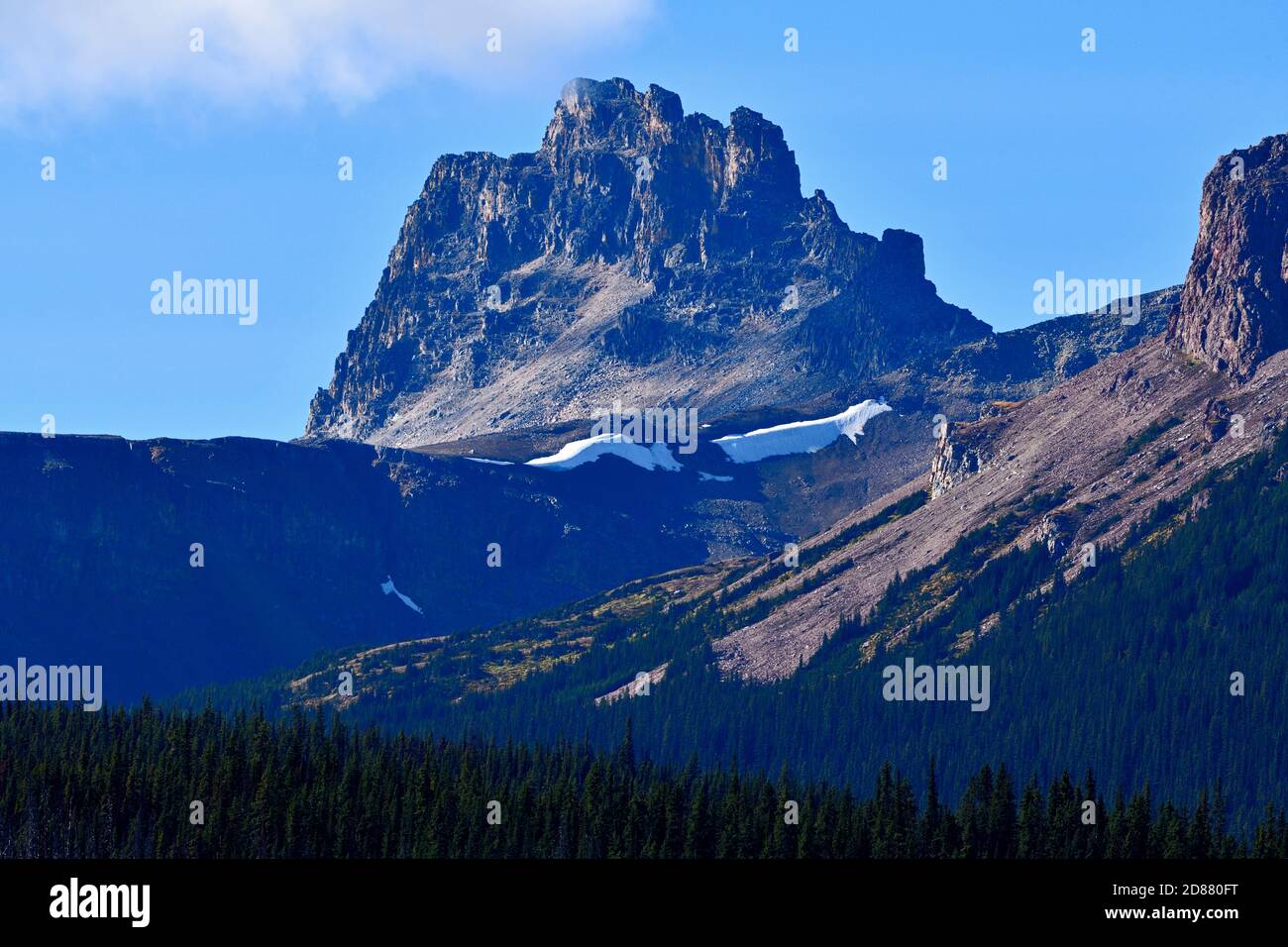 A landscape image of a rocky mountain peak eroded by the elements in Jasper National Park Alberta Canada Stock Photo