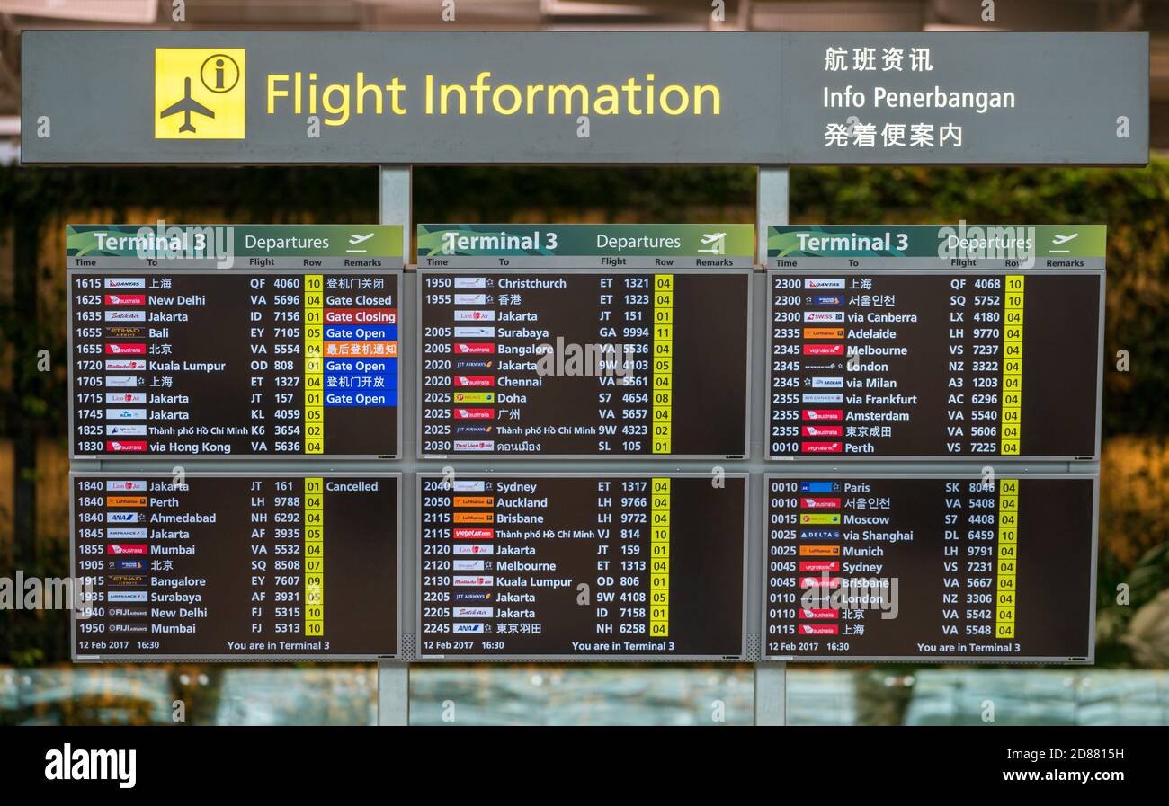 Singapore, SINGAPORE - FEB 12, 2017: Flight information board in Changi airport in Singapore showing various flight to international destination. Stock Photo