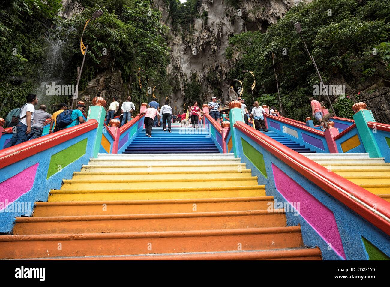 Batu Caves, Malaysia - 7 September, 2018 : Unidentified visitors at colorful staircase at Murugan Temple Batu Caves, Malaysia - Batu Caves is the foca Stock Photo