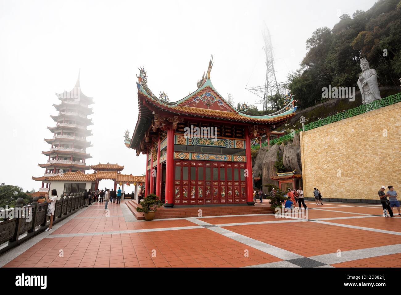 Genting Highland, Malaysia - Nov 20, 2018: Unidentified tourists visiting the scenic site of foggy Chin Swee Temple, Genting Highland, Malaysia - The Stock Photo