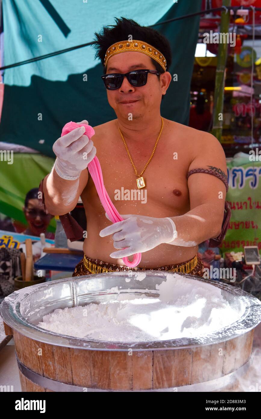 Man making Dragon's Beard Candy , Chiang Mai, Thailand Stock Photo