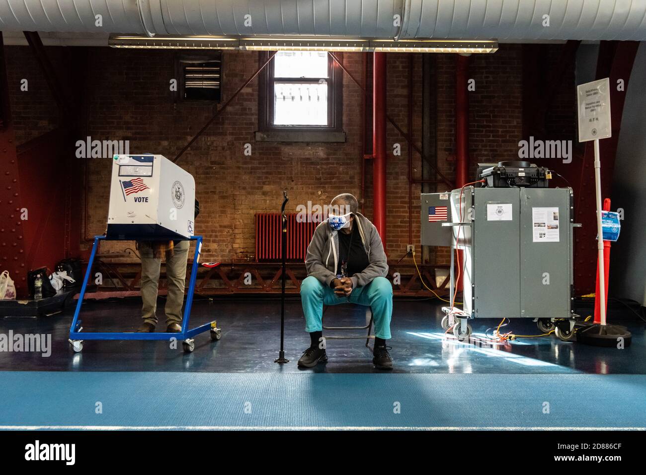 Brooklyn, United States Of America. 27th Oct, 2020. After waiting in an