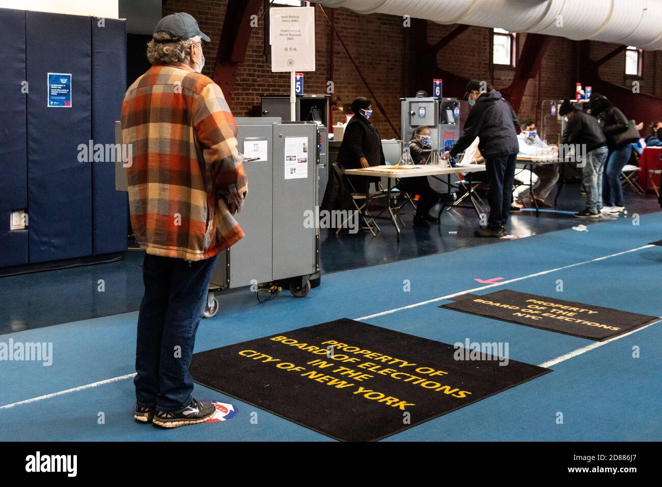 Brooklyn, United States Of America. 27th Oct, 2020. After waiting in an