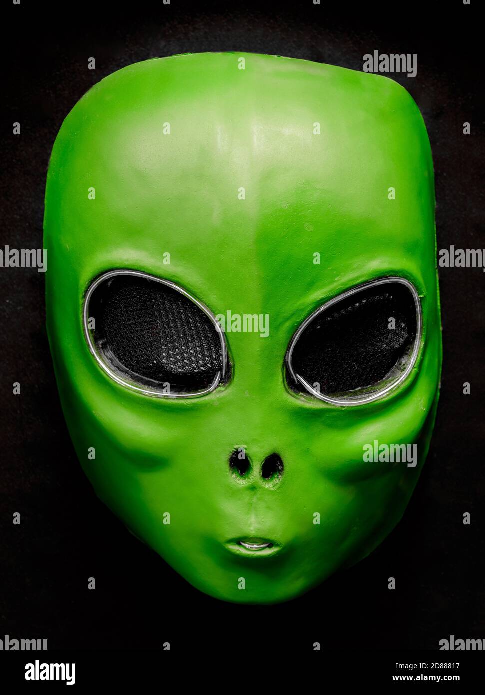 El Wire Alien Face Mask Isolated Against Black Background Stock Photo