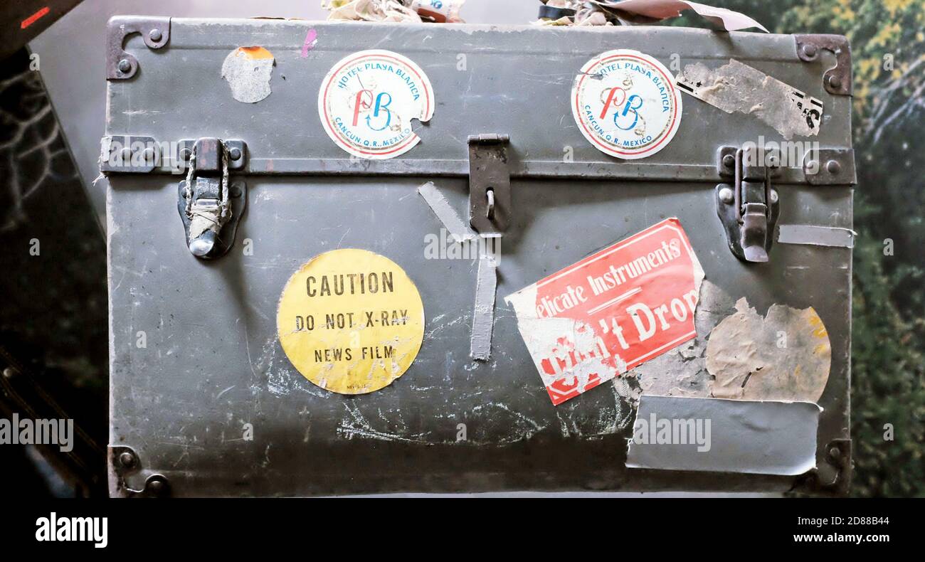 Old photographers luggage case with stickers used to protect camera equipment and film when traveling. Stock Photo