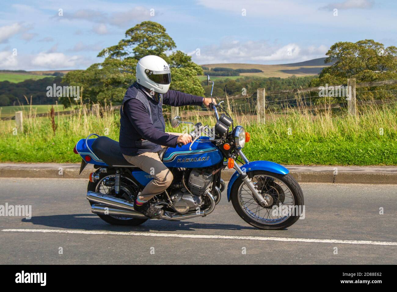 1972 70s blue Kawasaki; 748cc Motorbike rider; two wheeled transport ...