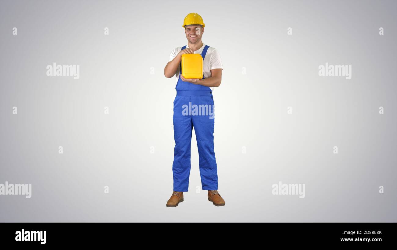 Construction worker advertising construction material in caniste Stock Photo