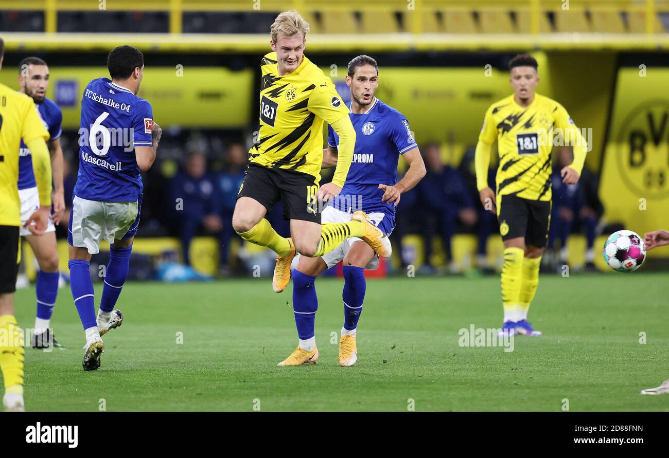 Julian Brandt of Borussia Dortmund and Omar Mascarell of Schalke 04