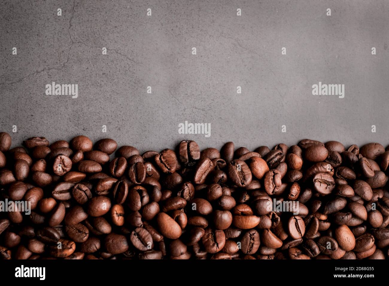 Coffee beans frames at dark gray background. Copy space for your text Stock Photo