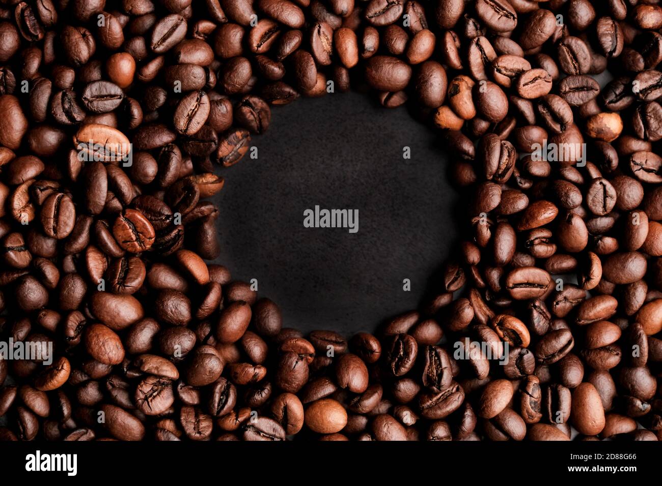 Coffee beans frames at dark gray background. Copy space  for your text Stock Photo