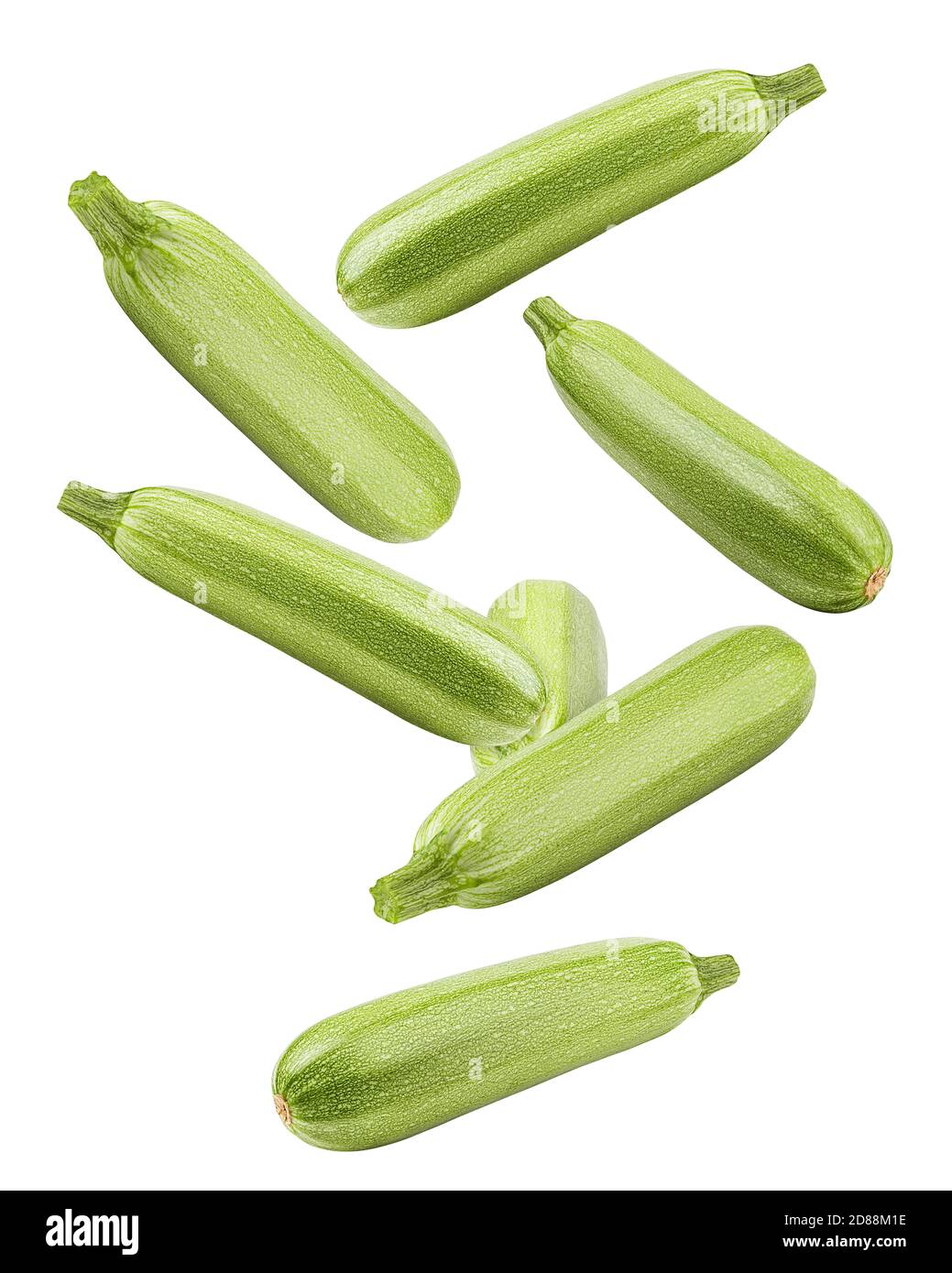 Falling zucchini isolated on white background, clipping path, full depth of field Stock Photo