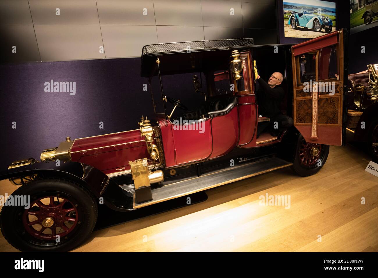 1911 Rolls-Royce 40/50hp Silver Ghost Semi-Open Drive Limousine, with an estimate of £1,000,000 Ð 1,300,000 is polished during a press preview for the Golden Age of Motoring sale at Bonhams in London. Stock Photo