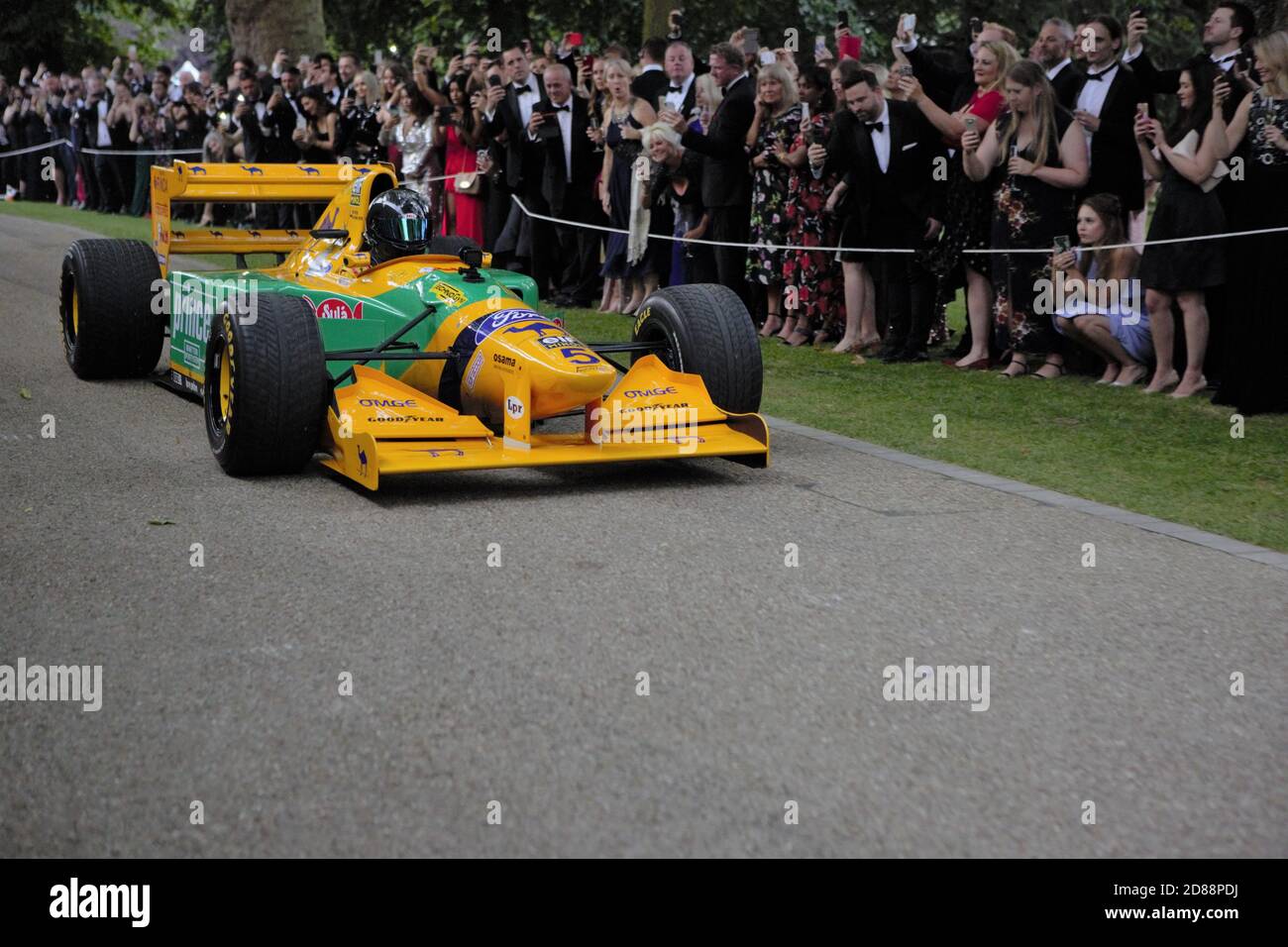 The 1992 Michael Schumacher Benetton B192 seen during the Live show performance at the 2019 Grand Prix Ball. Stock Photo