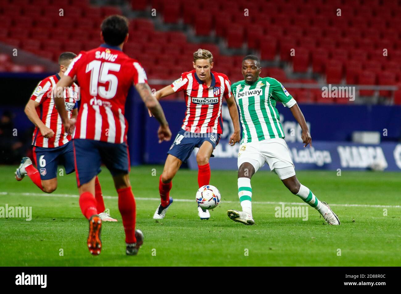 William Carvalho of Real Betis and Nehuen Perez of Atletico de Madrid in action during the Spanish championship La Liga football match between Atlet C Stock Photo