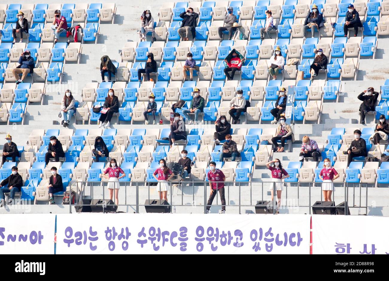 South Korea's K league soccer fans, Oct 18, 2020 - Football/Soccer : Socially distanced soccer fans during South Korea's 2020 K League 2 Round 24 match between Suwon FC 3-4 Jeonnam Dragons FC at Suwon Stadium in Suwon, south of Seoul, South Korea. Soccer fans were allowed again into K-League matches from October 16, following an easing of Covid-19 coronavirus restrictions. South Korean government eased the ban on soccer crowd after daily domestic infections of Covid-19 stayed in double figures for two weeks. (Photo by Lee Jae-Won/AFLO) (SOUTH KOREA) Stock Photo