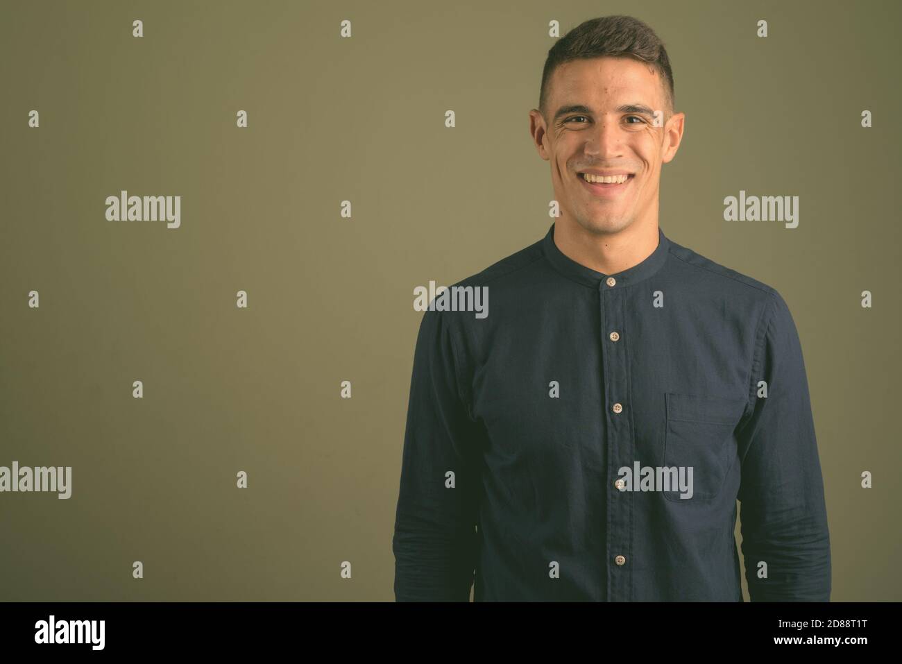 Portrait of happy young handsome businessman smiling Stock Photo - Alamy