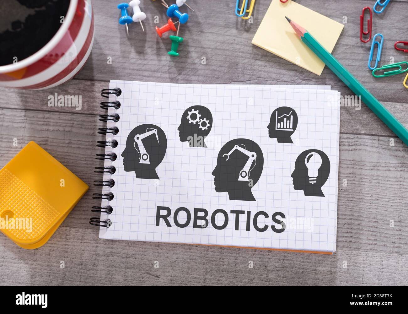 Robotics concept drawn on a notepad placed on a desk Stock Photo