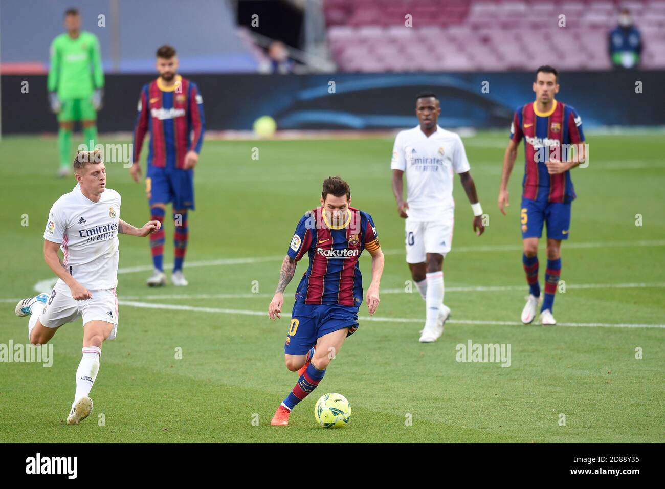 Lionel Messi of FC Barcelona and Toni Kroos of Real Madrid during the La Liga match between FC Barcelona and Real Madrid played at Camp Nou Stadium on October 24, 2020 in Barcelona, Spain. (Photo by Sergio Ruiz/PRESSINPHOTO) Credit: Pro Shots/Alamy Live News Stock Photo