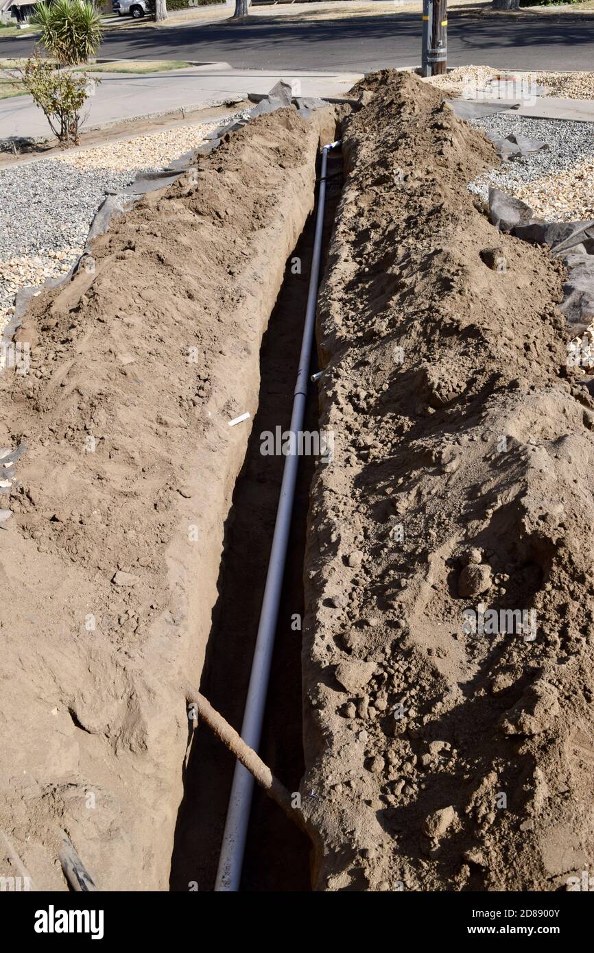Line Through Ground Hose pipe in the street hi-res stock photography and images - Alamy