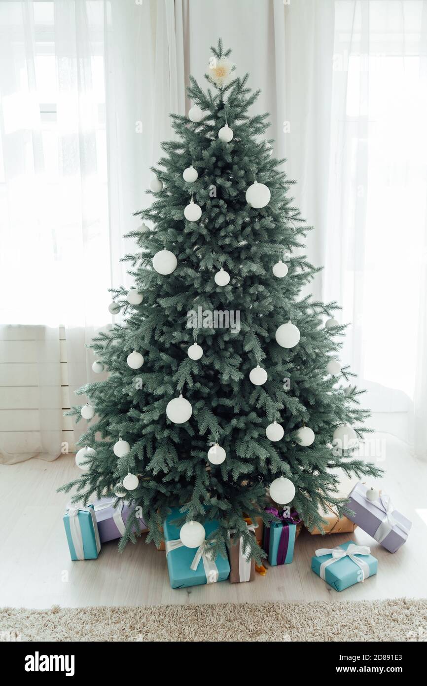 Christmas tree pine with gifts New Year decor house 2021 2022 Stock Photo -  Alamy
