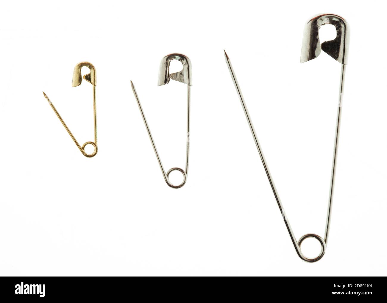 Gold pins Cut Out Stock Images & Pictures Alamy