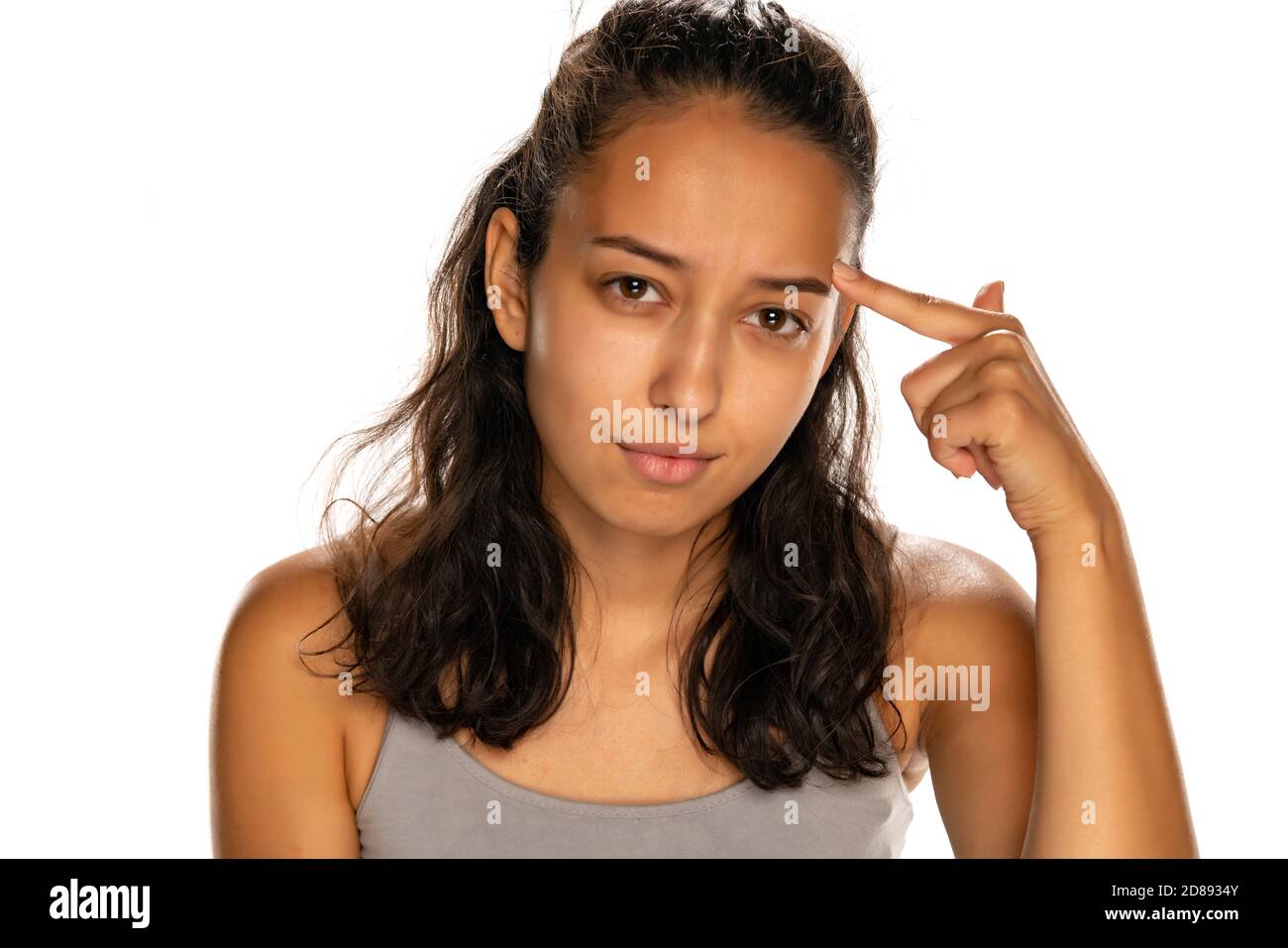 Finger forehead woman hires stock photography and images Alamy