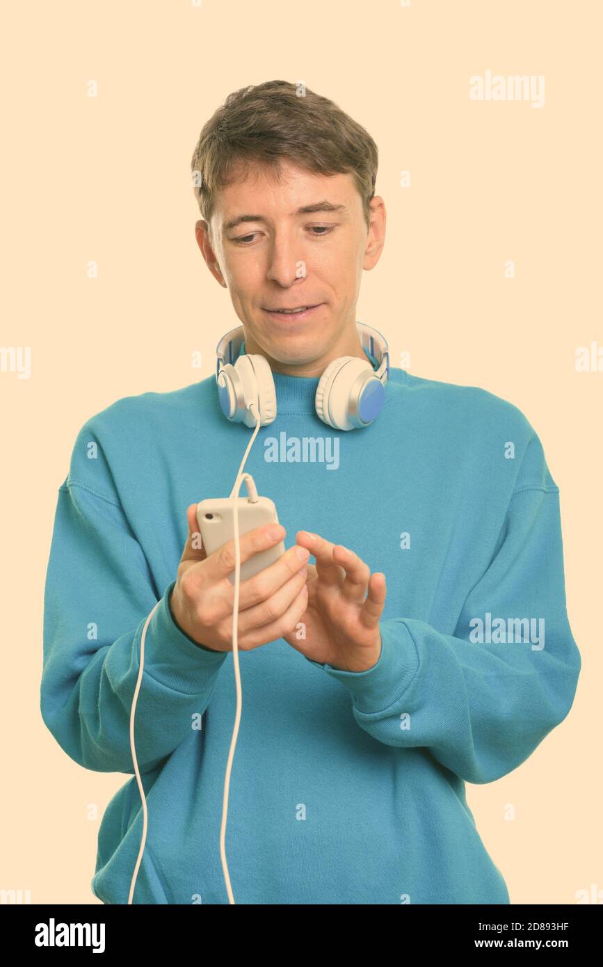 Man wearing headphones around neck hires stock photography and images Alamy