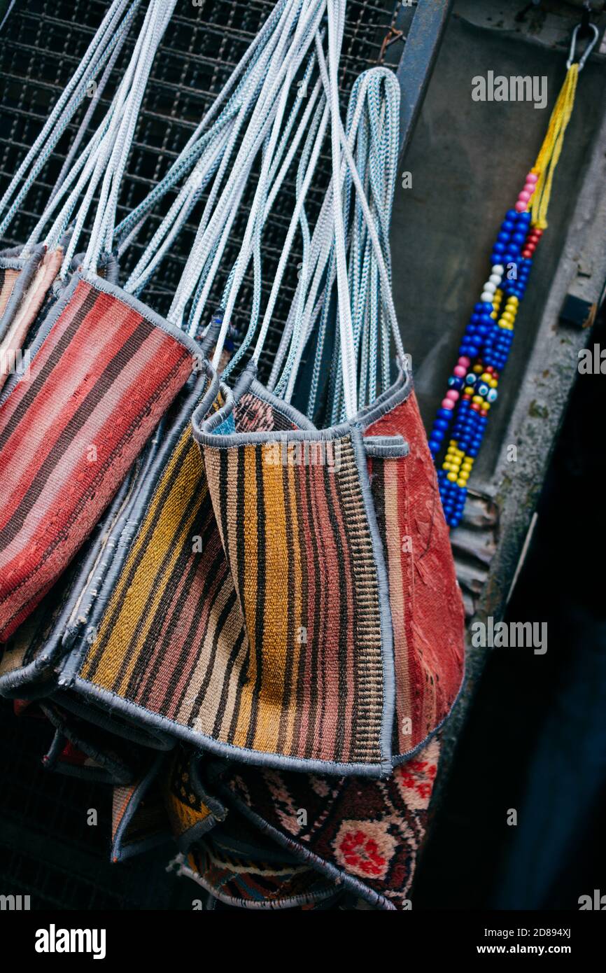 Closeup of colorful craft bags in a store Stock Photo by wirestock