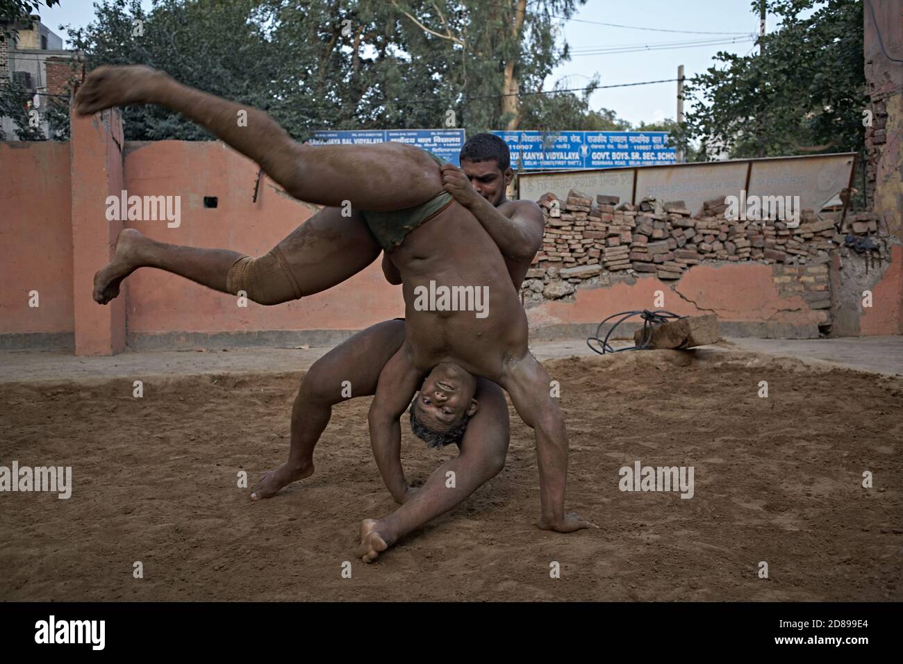 Delhi, India, May 2012. Kushti fighters on the Akara in their daily training. Stock Photo
