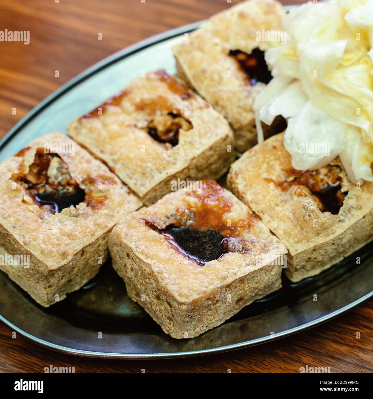 Deep fried stinky tofu, fermented bean curd with pickled cabbage