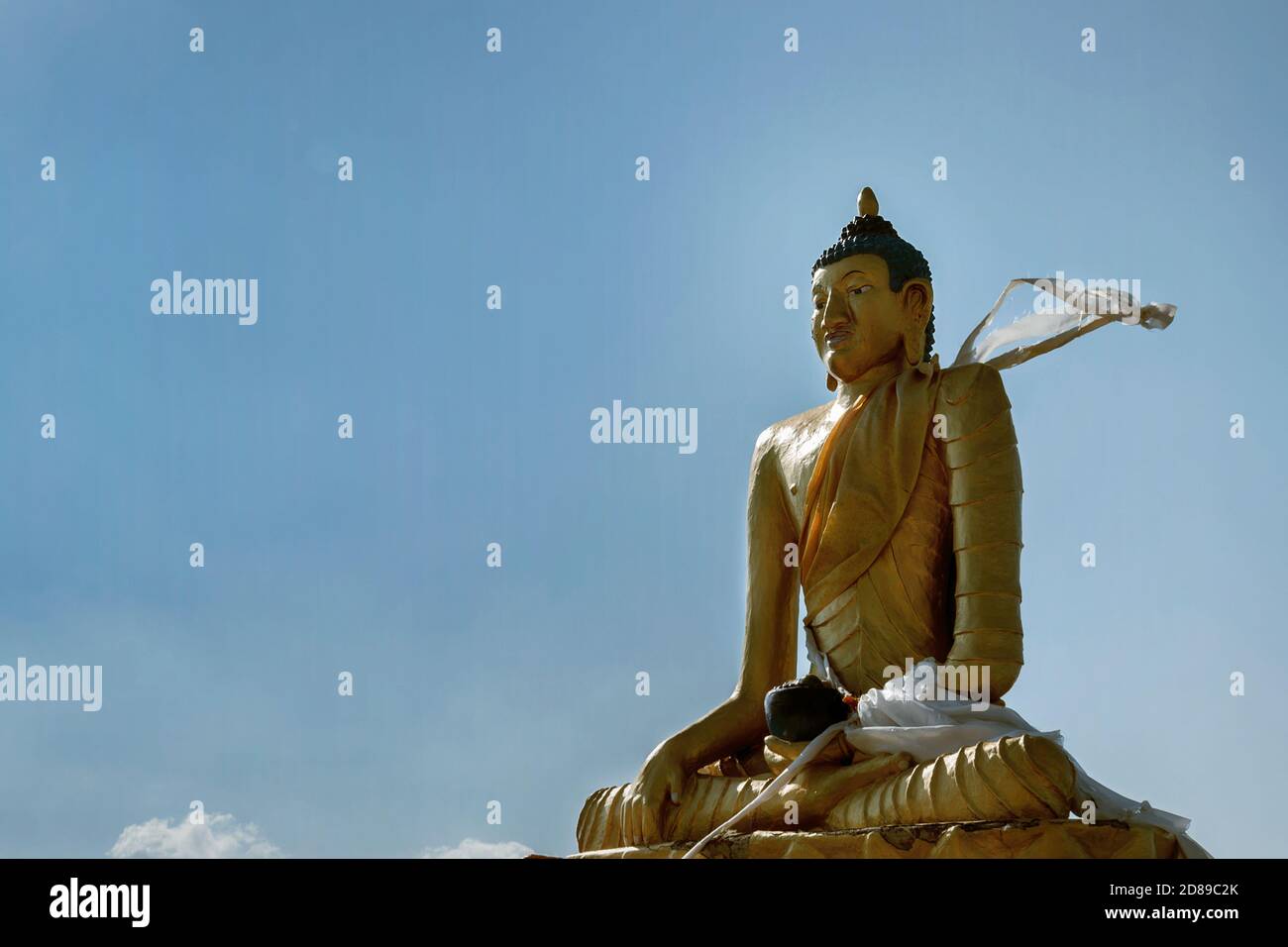 Statue of Lord Buddha under blue sky Stock Photo - Alamy