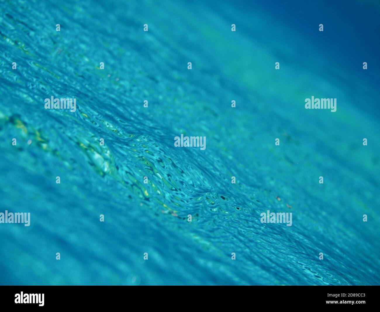 Water surface abstract defocused ripple background Stock Photo