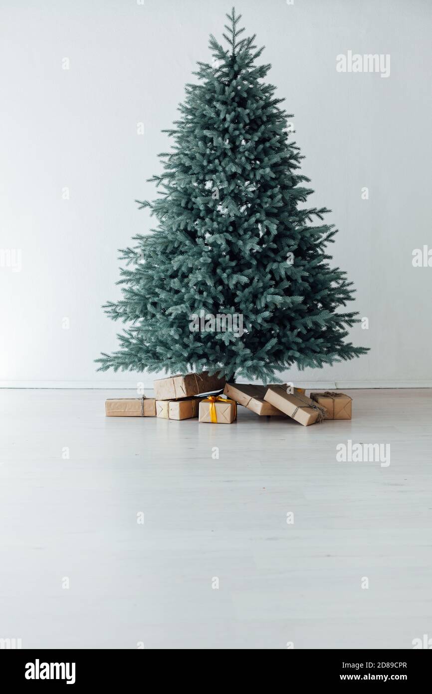 Christmas Tree Pine With Gifts New Year Decor House 2021 2022 Stock Photo - Alamy