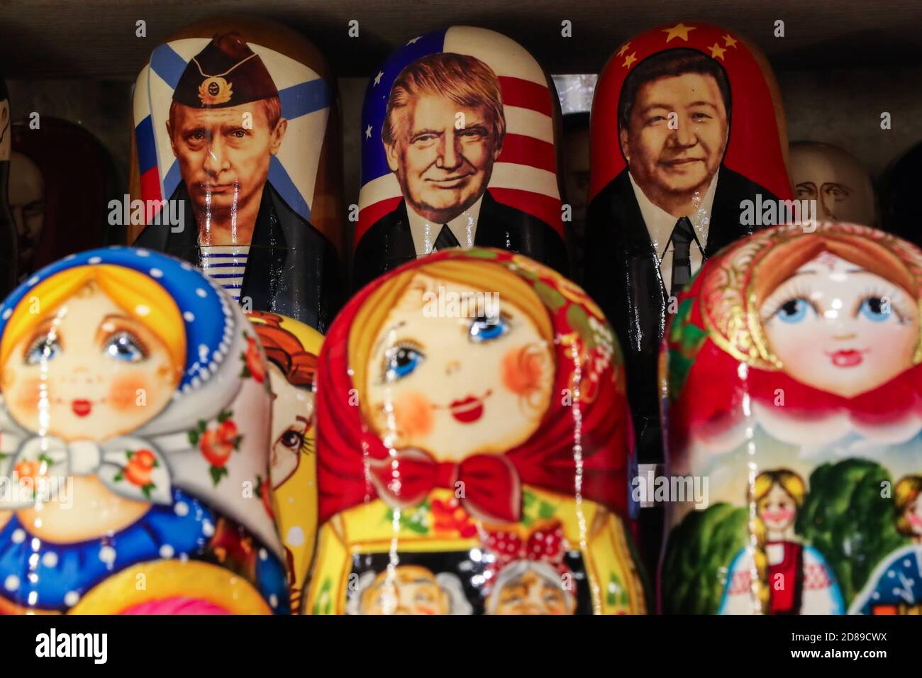 St Petersburg, Russia. 28th Oct, 2020. Pictured in this illustration are Russian  dolls with the likenesses of Russia's President Vladimir Putin, US  President Donald Trump and China's President Xi Jinping (L-R back),